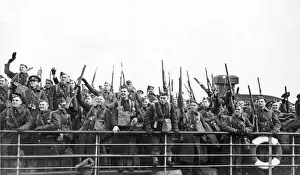 Phoney War Prints: The Canadian Troops Arrive in Britain, waving aloft their rifles