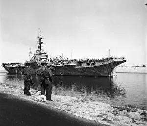 Canal Zone 1952 The Aircraft Carrier HMS Vengence passes through the Suez Canal