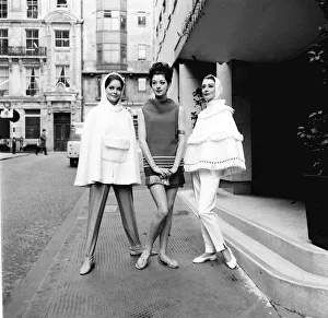 Cloak Prints: The cape became the item every girl wanted in 1962. These models posed in the street