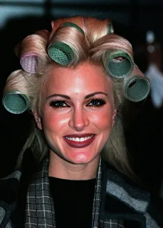Caprice having her hair and make up done at the Littlewoods Fashion Show With rollers in