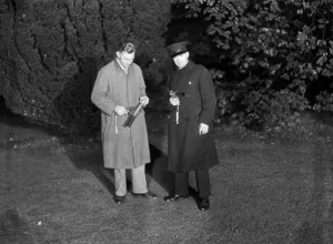01206 Prints: Capt Ayre at Hanworth. Photographed at night by light of red flare. October 1932