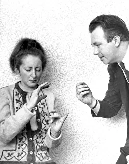 Captain Harold Dodds an amateur hypnotist with his 21 year old assistant Irene Wilson who