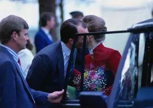 Romantic Prints: Captain Mark Phillips June 1988 giving Princess Anne a kiss on cheek at car door