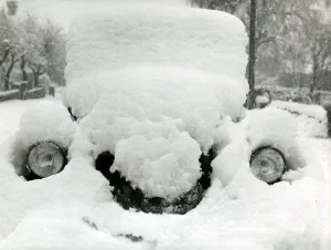 00182 Prints: A car covered in snow after a heavy snowfall in Kent December 1962 A&copy