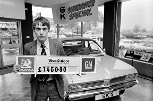 Sales Prints: A car dealer putting cars on sale in his garage forecourt in Brighton. May 1975