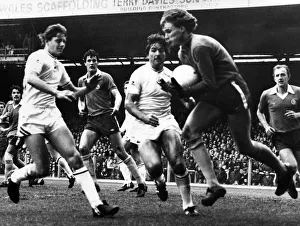 Cardiff City goalkeeper Andrew Dibble collects the ball chased by Swansea