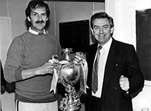 Cardiff City manager Frank Burrows shares a moment of glory after City won the Welsh Cup