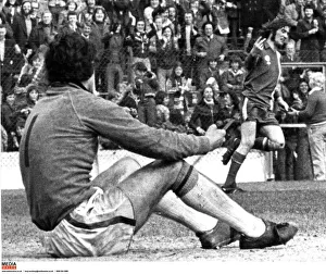 Cardiff Citys Robin Friday gives a two finger salute to Luton goalkeeper Milija