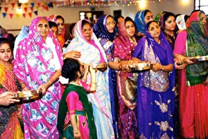Cardiff - Religion - Old - Women with simple offerings to the gods