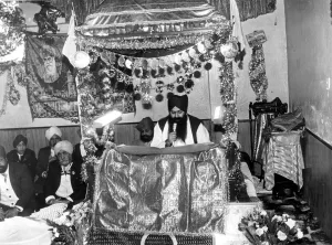 Worship Prints: Cardiff - Religion - Priest Charananjit Singh holds a reading at the Sikh temple in