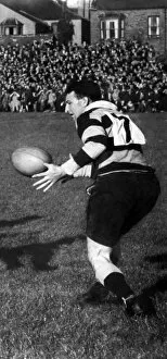 00705 Collection: Cardiff and Wales rugby union player Haydn Tanner in action. Circa 1948