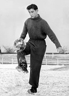 Carlisle United footballer Geoff Twentyman practices his ball control skills in the snow