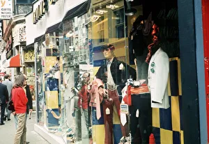 Fashion Clothing Prints: Carnaby Street, London. Image shows trendy boutiques. 1960s