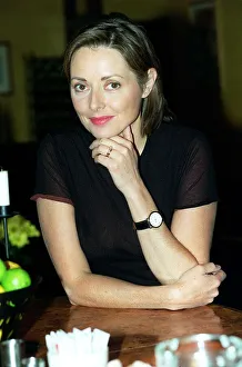 Carol Vorderman TV Presenter June 1998 Sitting at table A©mirrorpix