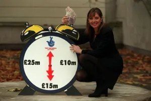 Carol Vorderman TV Presenter November 97 With a lottery clock which shows an arrow