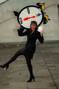 Carol Vorderman TV Presenter November 97 With a lottery clock which shows an arrow