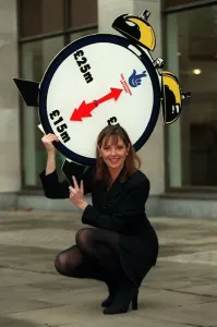 Carol Vorderman TV Presenter November 97 With a lottery clock which shows an arrow