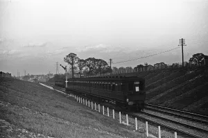 Tracks Prints: A three carriage Electric Multiple Unit train seen here on the Chessington branch line