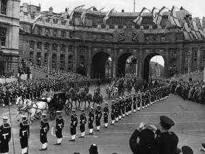 Coronation Prints: The Carriage Procession of Prime Ministers passes underneath Admiralty Arch as it makes