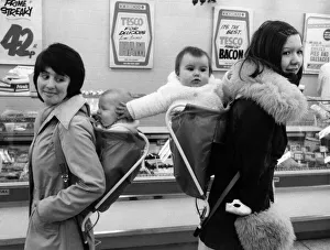 Supermarket Prints: A Carrier bag for baby. These baby-carrier bags may put a burden on a busy mother