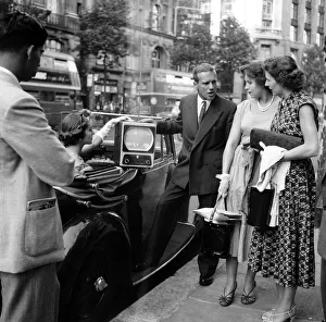 Portable Prints: A carry-it-around'television set combined with sound radio - the most