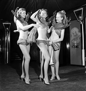 Casino showgirls model their latest costumes which include the invisible bra
