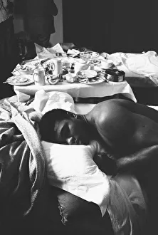 00328 Prints: Cassius Clay aka (Muhammad Ali) catches up on some sleep in the Piccadilly Hotel