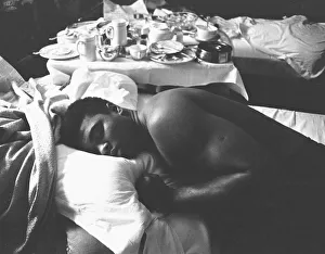 Cassius Clay aka (Muhammad Ali) catches up on some sleep in the Piccadilly Hotel