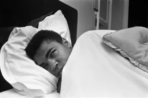Portrait Posed Prints: Cassius Clay aka (Muhammad Ali) catches up on some sleep in the Piccadilly Hotel
