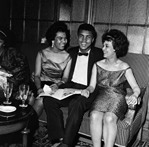 Females Prints: Cassius Clay aka (Muhammad Ali) pictured at the Piccadilly Hotel after beating