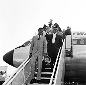 Stairs Prints: Cassius Clay aka (Muhammad Ali right) arriving at London Airport with brother Rudolph