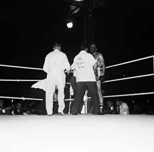 Heavy Weight Prints: Cassius Clay aka (Muhammad Ali) vs Henry Cooper in their first fight at Wembley Stadium