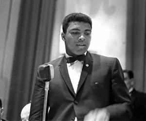 Tuxedo Prints: Cassius Clay (Muhammad Ali) attends a sports writers reception