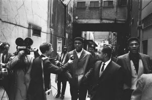 Cassius Clay (Muhammad Ali) seen here being interviewed by a BBC camera crew during a