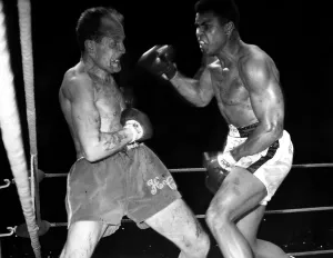 Cassius Clay ( Muhammad Ali ), World Heavyweight Champion and challenger