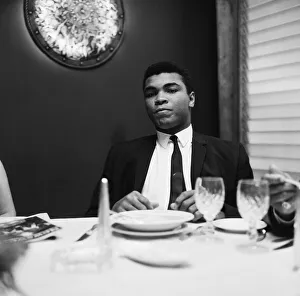 Cassius Clay (Pictured) having lunch in London before his trip to Scotland for an