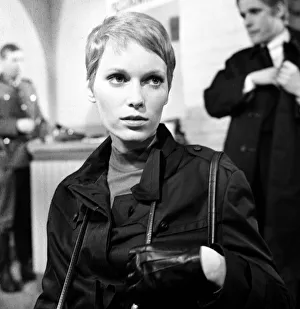 Cast and crew on the set of A Dandy in Aspic. The scene is representing a checkpoint in