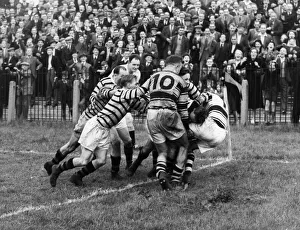 1949 Prints: Castleford v Hull rugby match. Bastow of Castleford was in the middle of this scrimmage