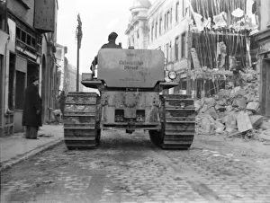 00101 Prints: A Caterpillar Diesel D8 tractor moves slowly along in Smithford Street, Coventry