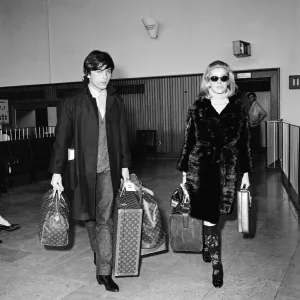 Catherine Deneuve, actress, and husband fashion photographer David Bailey arrive