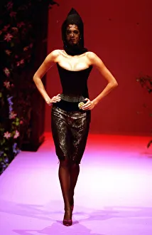 Strapless Prints: A Catwalk model shows a new design by designer Lacroix September 1995