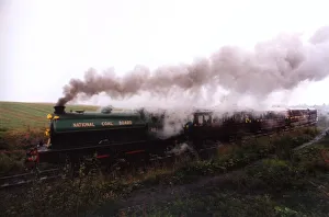 00327 Prints: The Causey Rambler makes its way out of the new East Tanfield Railway station on 27th