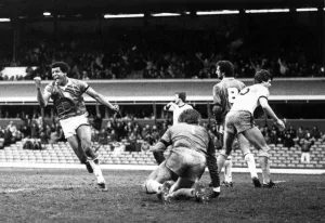 Celebrating Prints: Celebrations, Howard Gayle turns away in triumph after completing Blues
