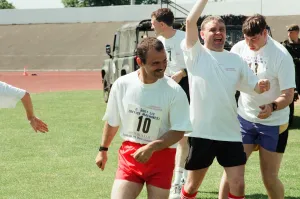 Celebrations after tug-of-war at the annual sports day at Clairville Stadium for people