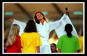 Celine Dion on stage at Murrayfield concert children on stage singing with her