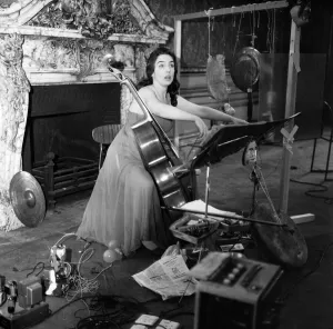 Cellist Charlotte Moorman rehearsing at 18 Carlton House Terrace for her particular sound