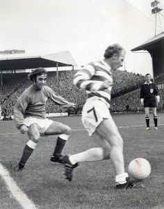 00269 Prints: celtic fc jimmy johnstone takes on rangers player tommy mclean 1971 Celtic