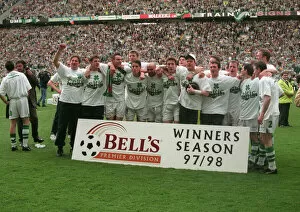 00636 Collection: Celtic players celebrate winning the league championship 1998 with cup trophy winners