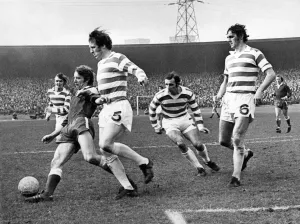Celtic v Aberdeen. McNell challenges Varga (Aberdeen) as Brogan and Connguy run in