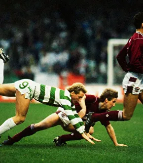 Celtic versus Hearts Premier League football Frank McAvennie tumbles after